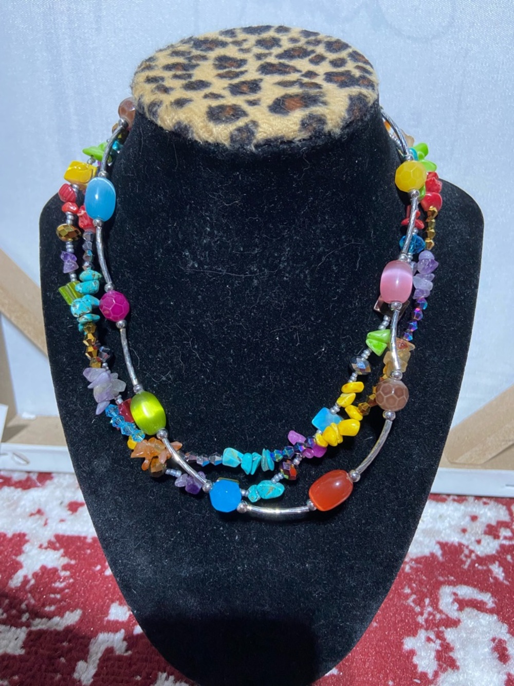 Silver Tone Mixed Media Triple Strand Necklace.